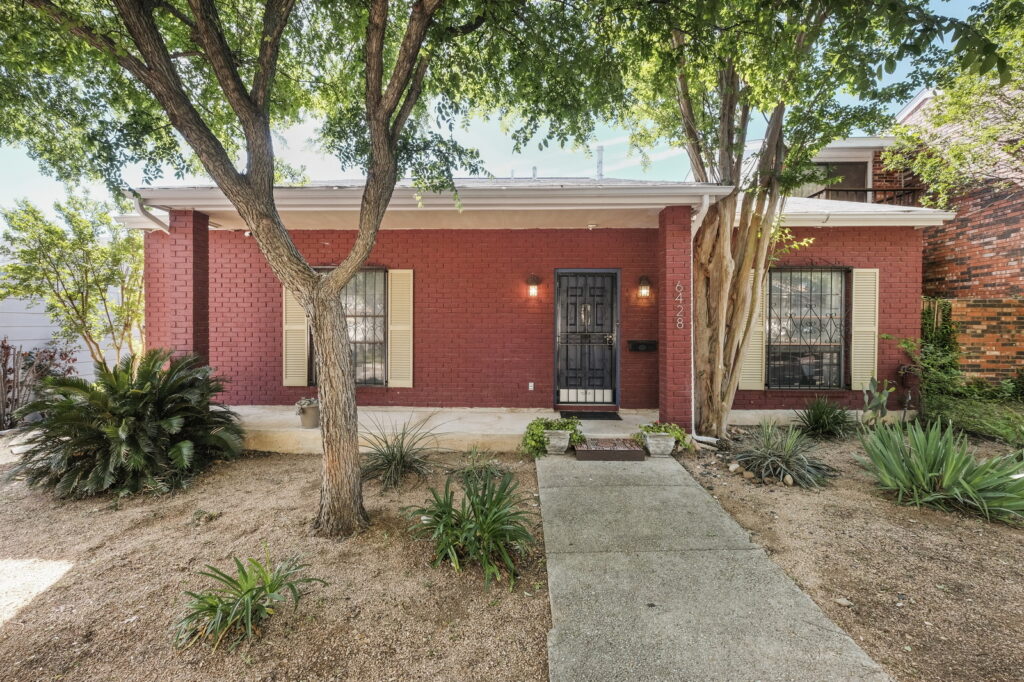 Front of home looks small, but has big surprises indoors!
